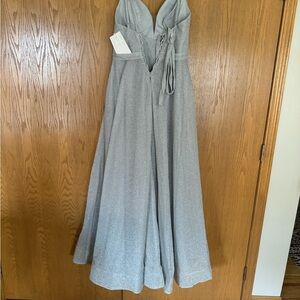 Sliver corset Prom dress never worn and still has tags size 10